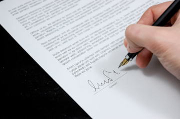 Client signing documents during a mobile notary appointment